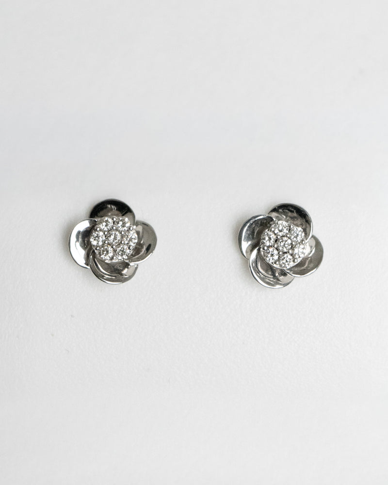 Arete para dama con diamante con montadura de 0.14Q en oro blanco de 14K